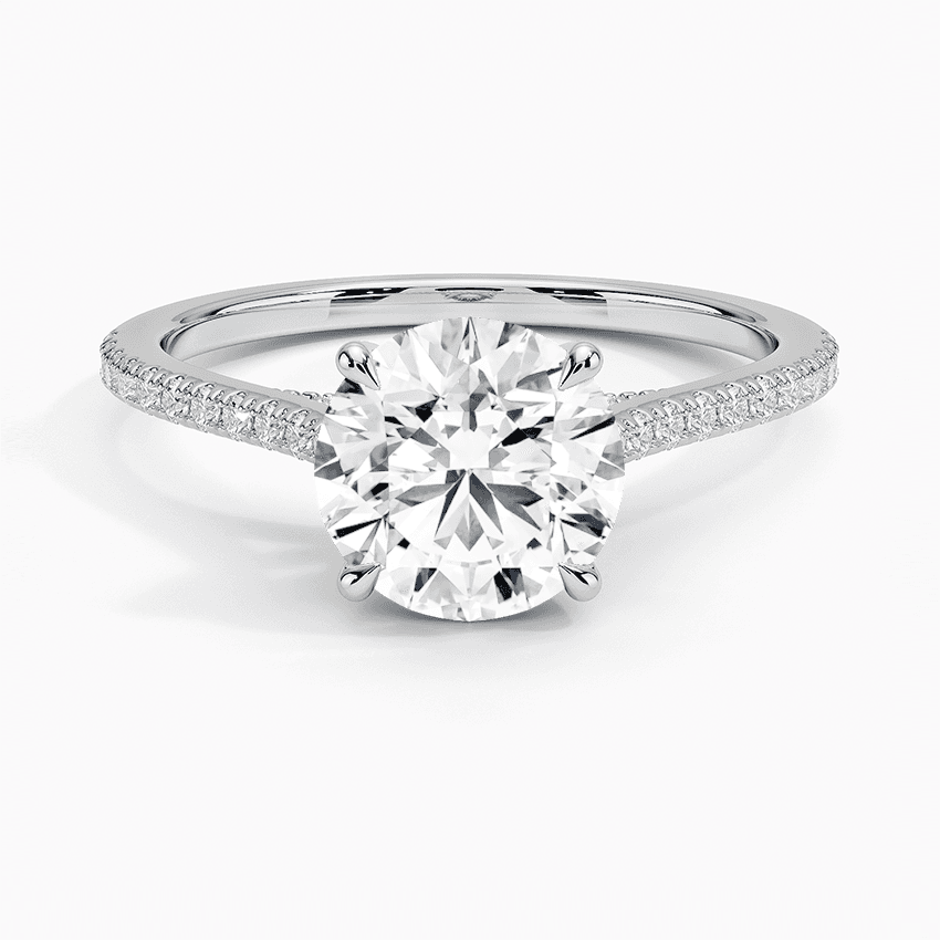 Förlovningsring i vitguld med dolt halo