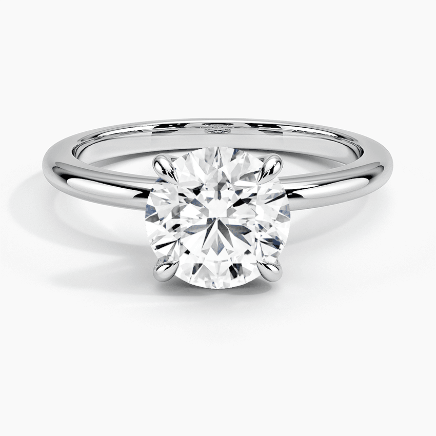 Förlovningsring i vitguld med enstensring