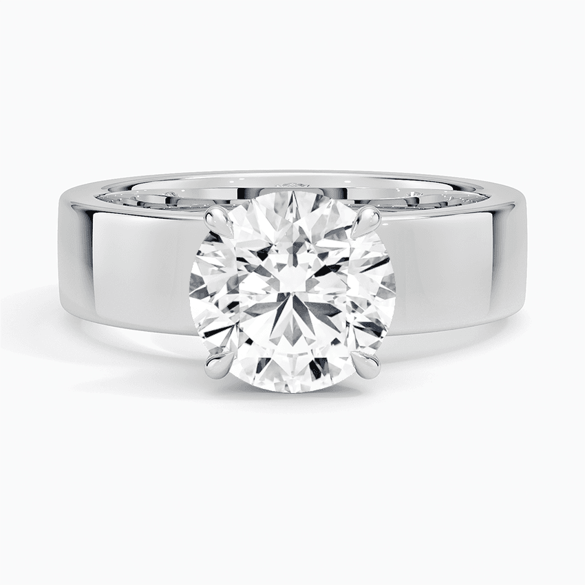 Förlovningsring i vitguld med dolt halo