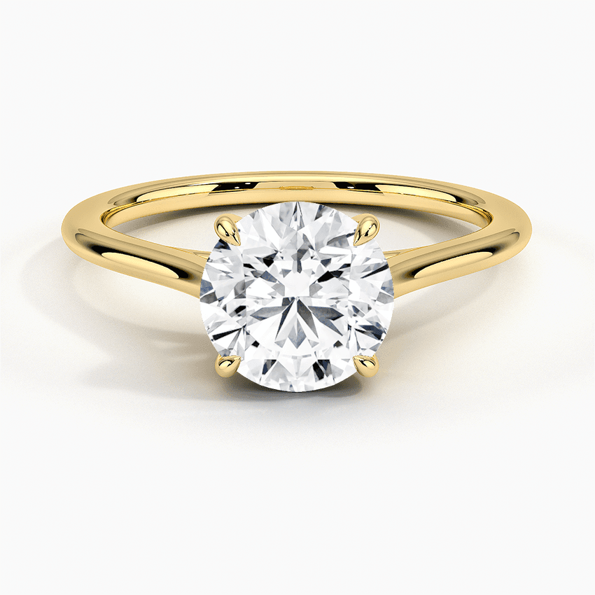 Förlovningsring i rödguld med enstensring