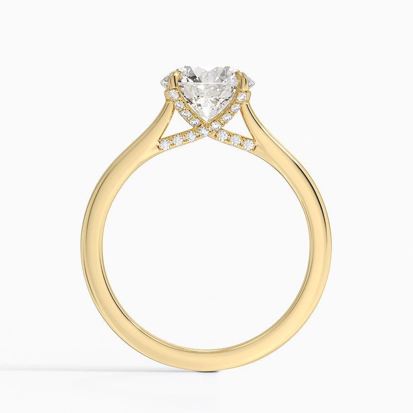 Förlovningsring i rödguld med dolt halo