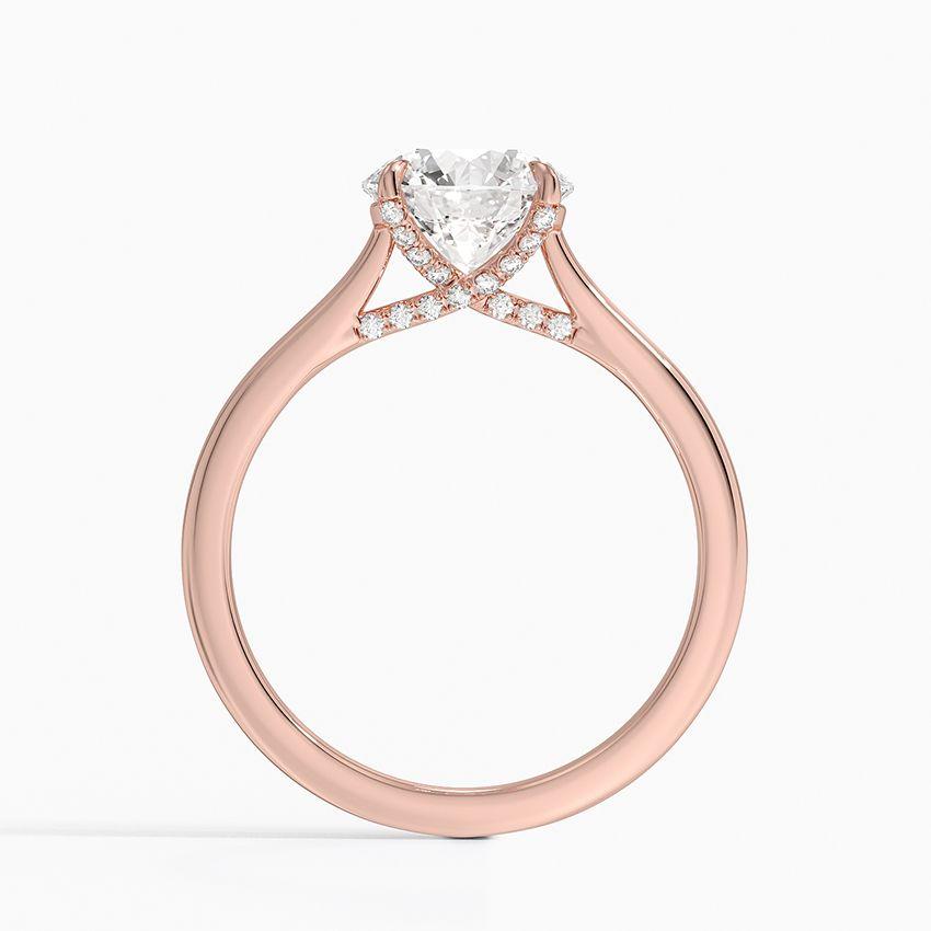 Förlovningsring i roséguld med dolt halo