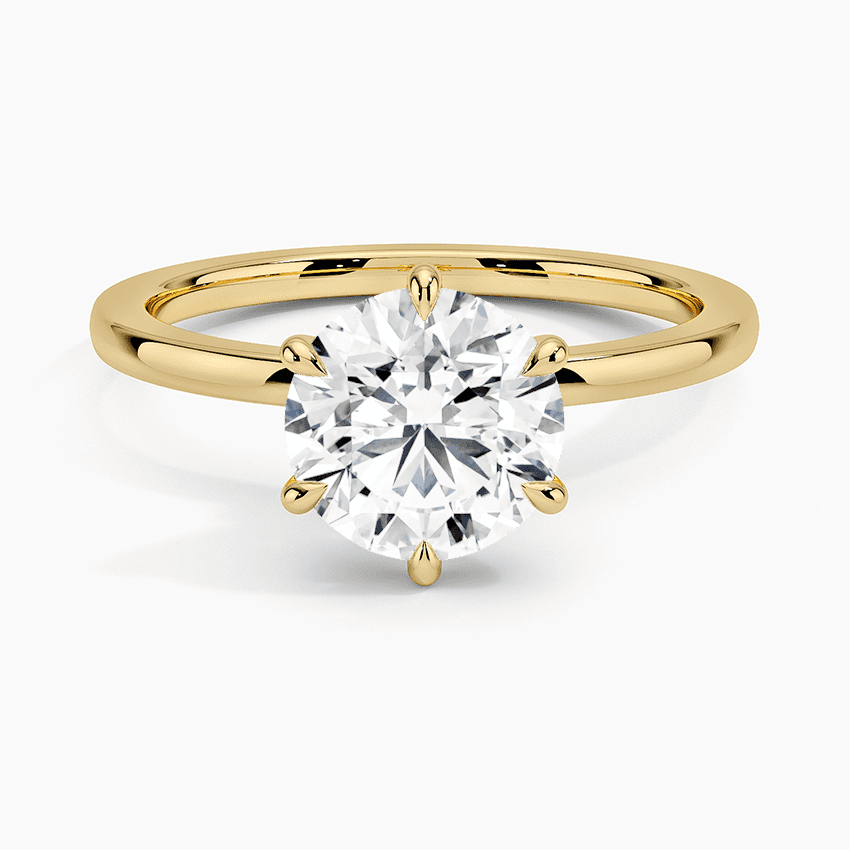 Förlovningsring i vitguld med dolt halo