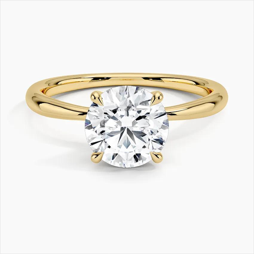 Förlovningsring i rödguld med enstensring