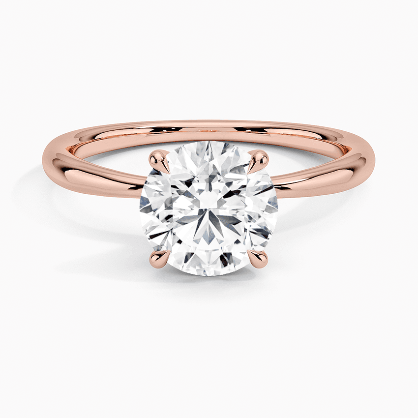 Förlovningsring i roséguld med enstensring