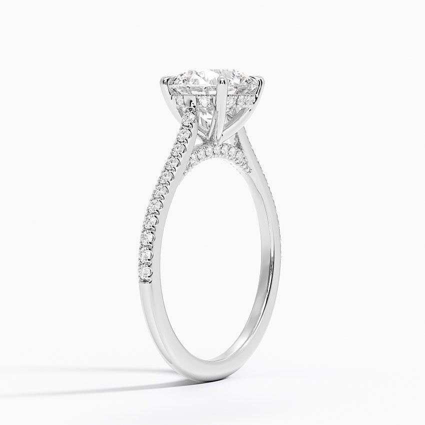 Förlovningsring i vitguld med dolt halo