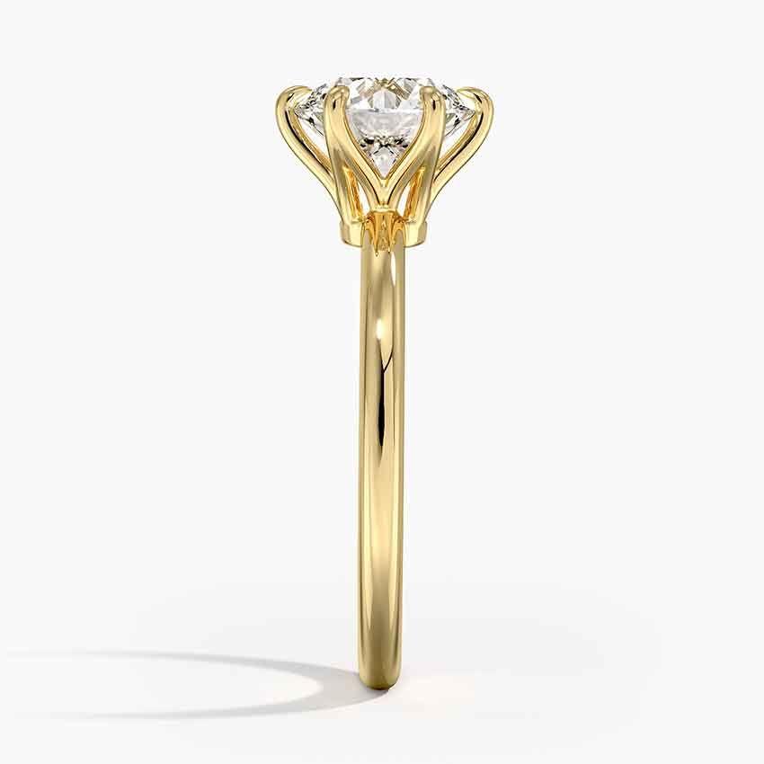 Förlovningsring i rödguld med enstensring