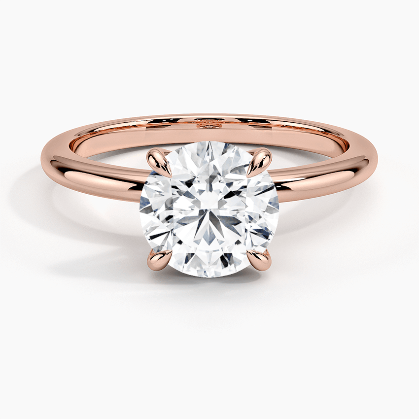 Förlovningsring i roséguld med enstensring