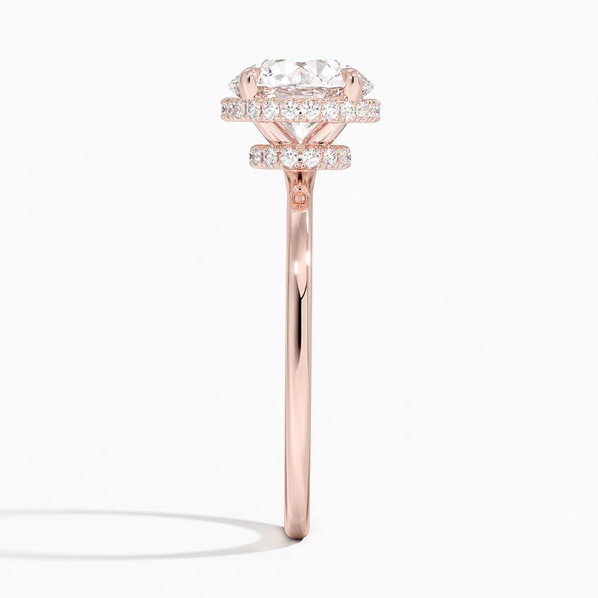 Förlovningsring i roséguld med dolt halo