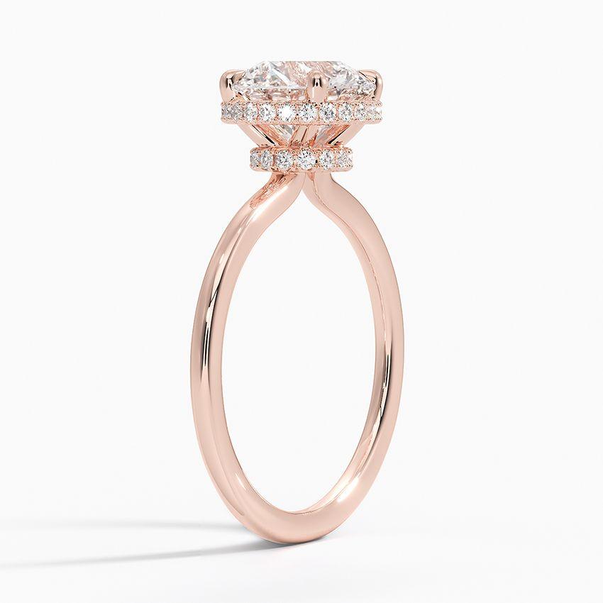 Förlovningsring i roséguld med dolt halo