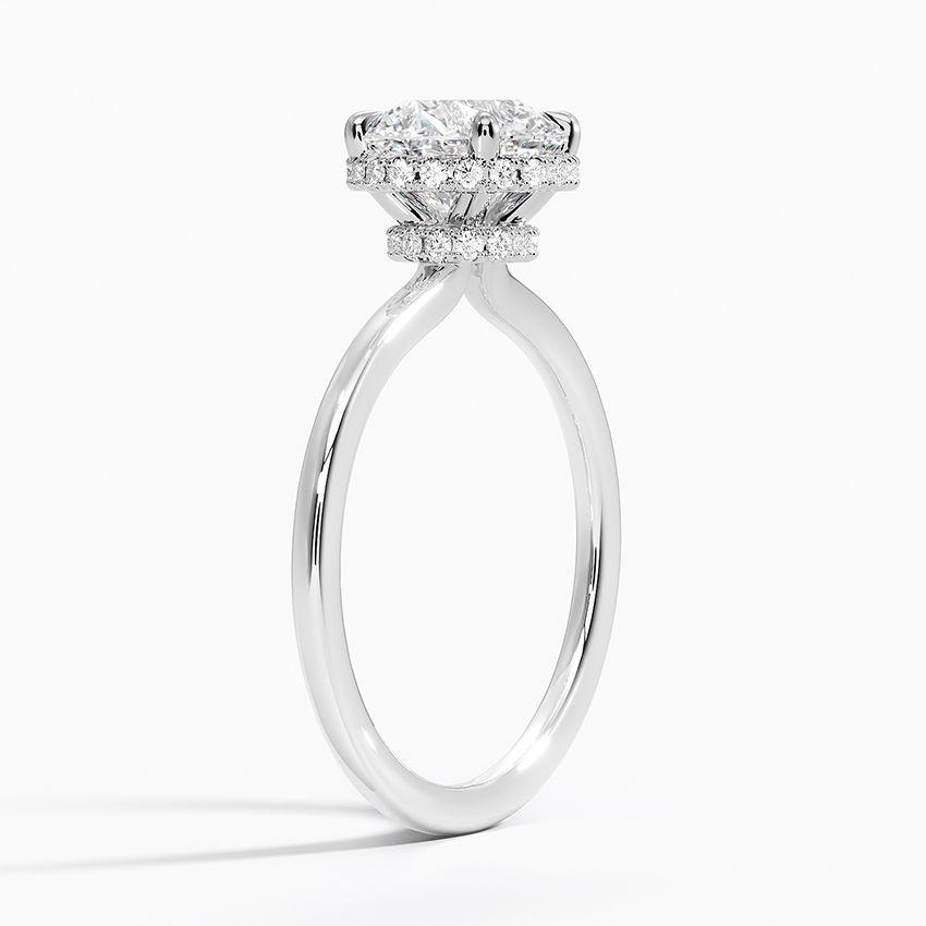 Förlovningsring i vitguld med dolt halo