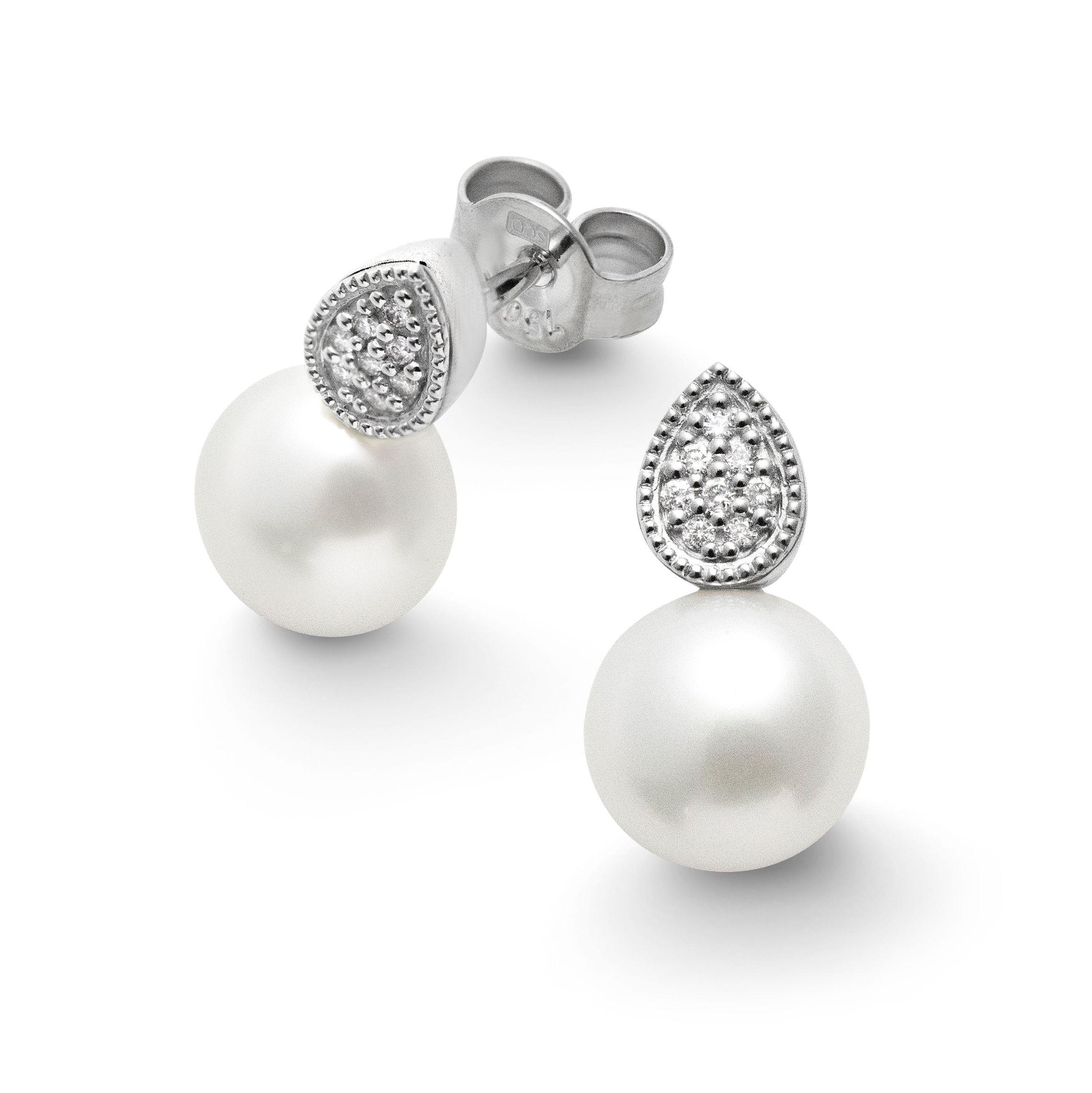 sotvatten-parla-orhange-med-diamant-i-vitguld08-63-171