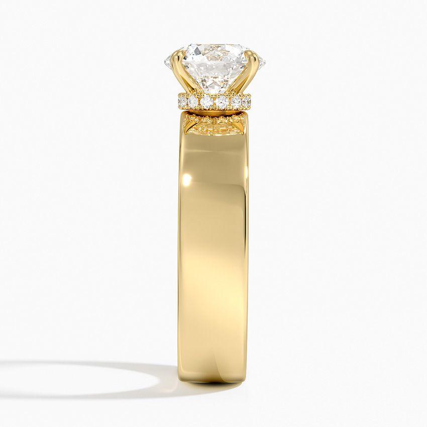 Förlovningsring i rödguld med dolt halo