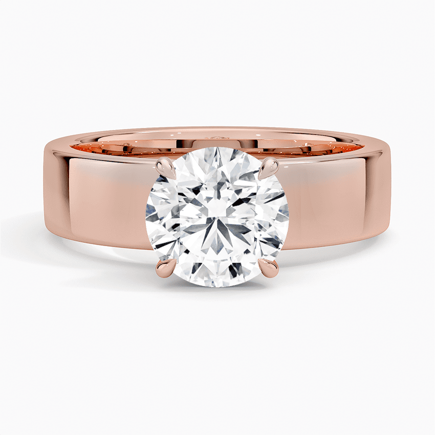 Förlovningsring i roséguld med dolt halo