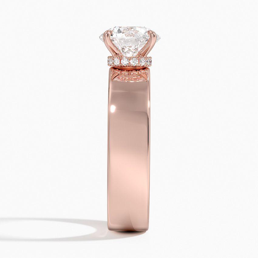 Förlovningsring i roséguld med dolt halo